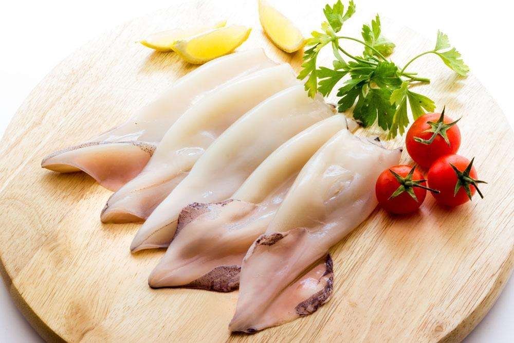 Squid Clean with Head 3/5 (Calamari)  鱿鱼仔 $5.35/磅